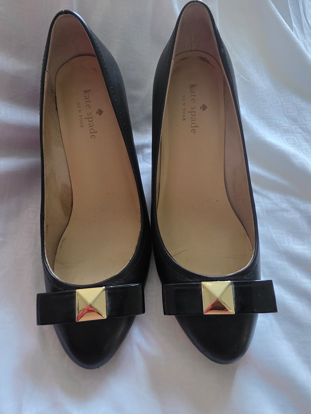 kate spade New York Black Bow Pointed Toe Pumps with Gold Accent